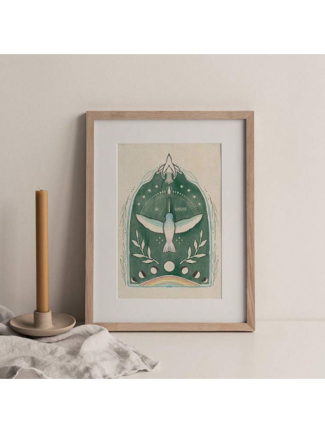 Elevate your sacred space with the Mystical Hummingbird Wall Art Poster, featuring a detailed bohemian moon illustration that blends spiritual symbolism with folk art charm. Perfect for enhancing altars or adding a serene, hippie-inspired touch to any room, this poster invites tranquility and positive energy. Crafted to inspire mindfulness and connection, it complements diverse decor styles while serving as a meaningful focal point in your spiritual practice.