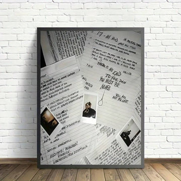 Monochrome handwritten journal collage canvas poster staged against a brick wall