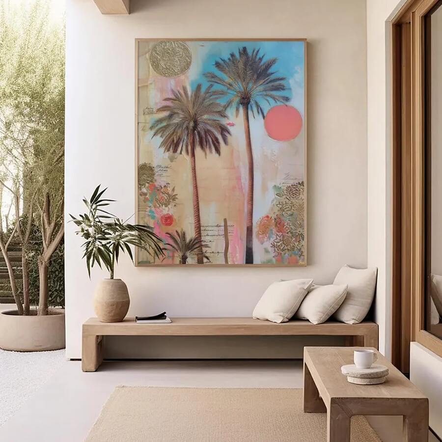 Palm tree canvas poster displayed above a bench in a bright coastal interior