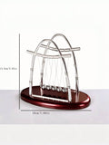 This Newton's Cradle Balance Toy is a must-have for any office space. With its unique design, it serves as both a decorative piece and a stress-relieving toy. Perfect for innovators looking for a creative outlet, this toy is a reminder of Newton's laws of motion and the balance needed for success.