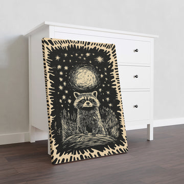 Enhance your living room, sofa backdrop or bedside decor with our Night Sky Raccoon Wall Art. This Black and Cream Woodcut Print adds a touch of nature and sophistication to any space. Expertly crafted, this unique piece is sure to capture attention and elevate your home decor.