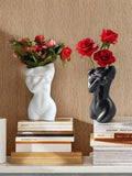 Elevate your modern home decor with the Nordic Chic Resin Flower Vase. Made from high-quality resin, this vase features a unique design inspired by Nordic aesthetics. Its durable construction and elegant design make it the perfect addition to any room. Add a touch of sophistication to your space with this stunning vase.