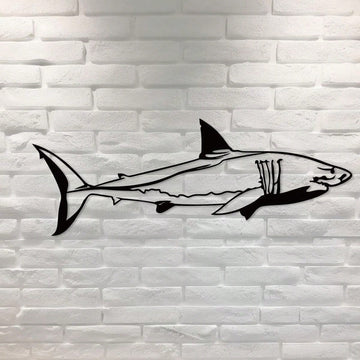 Unleash the power of the ocean with our Ocean Ruler Shark Metal Wall Decor. This ferocious addition to your home will make a bold statement while adding a touch of marine life to your space. Crafted with high-quality metal, this piece is both durable and stunning.