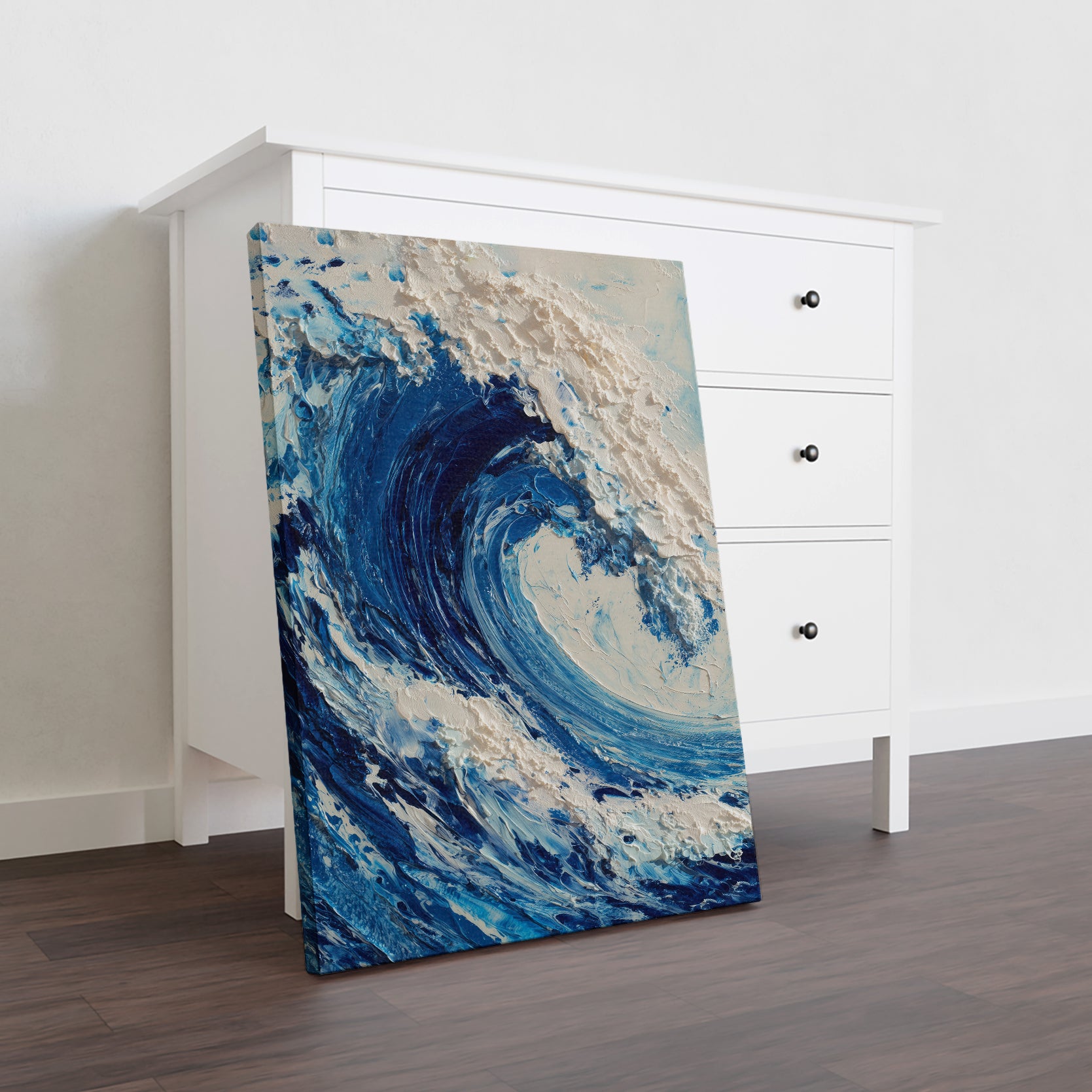 Capture the serene beauty of the sea with this Ocean Wave Canvas Wall Art. Featuring textured blue and white hues, this seascape painting adds depth and tranquility to any living room, sofa backdrop, or bedside area. Its expert craftsmanship enhances your home decor with a sophisticated coastal touch, creating a calming atmosphere that complements a variety of interior styles.