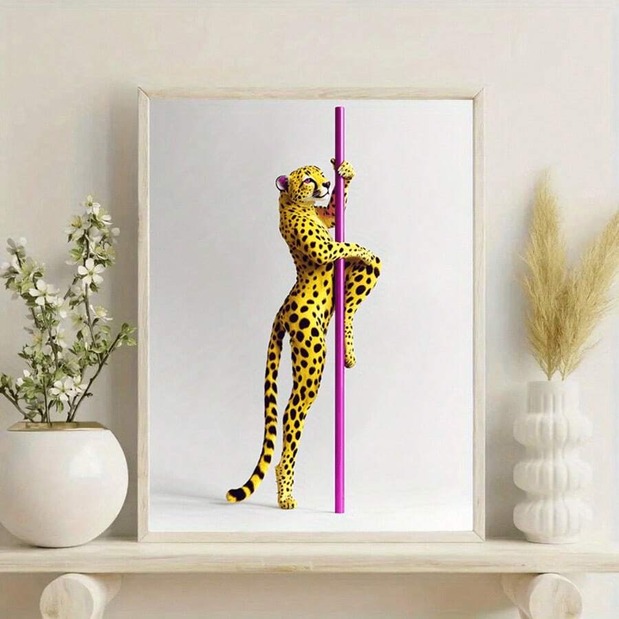 Framed yellow leopard and pink pole canvas poster on a decorative shelf