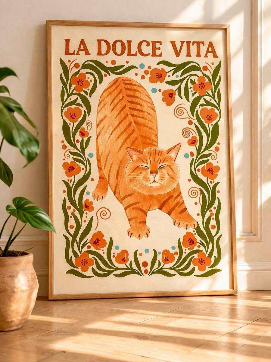 Close view of framed orange cat artwork in a plant-filled living room