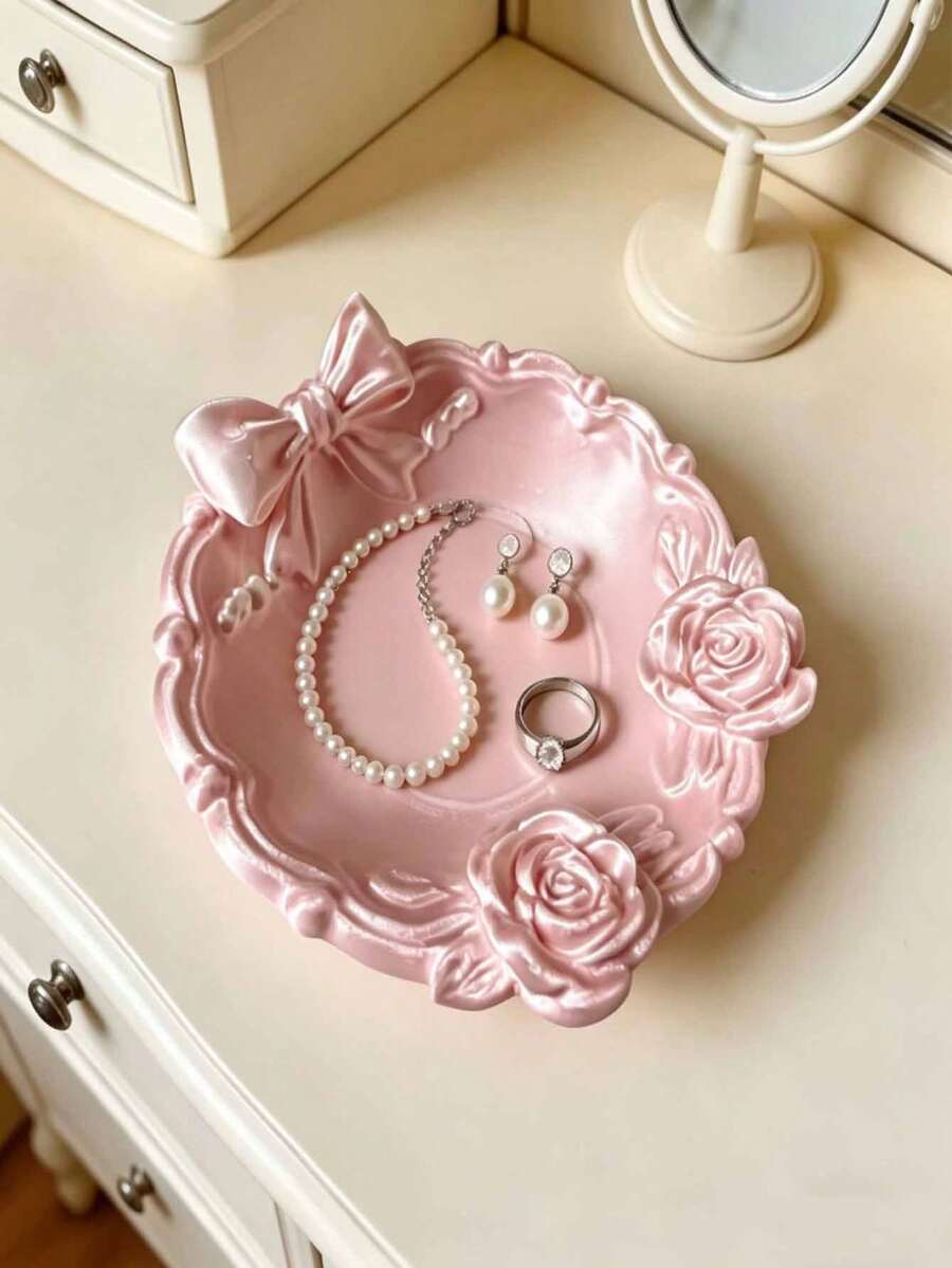 Pink bow tray with ruffled rim and rose details