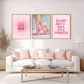 Pink high heels inspirational wall art above white sofa
