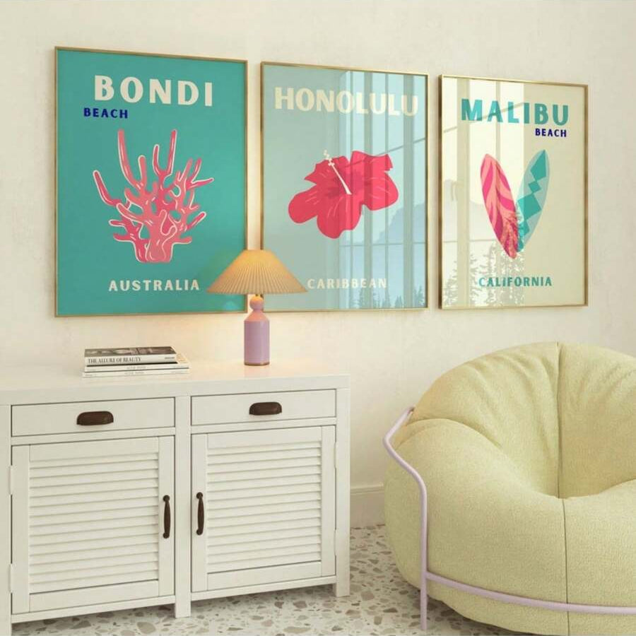 Framed three-piece retro beach print set featuring Bondi Honolulu and Malibu above a white console