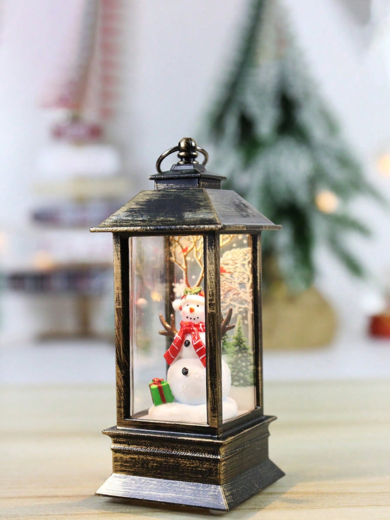 Add a touch of magic to your indoor holiday decor with our Random Magical Christmas Snowball Lantern. Powered by batteries, this elegant lantern will flash and sparkle, creating a festive atmosphere. Perfect for adding a festive touch to any room and creating a cozy, warm ambiance for the holidays.