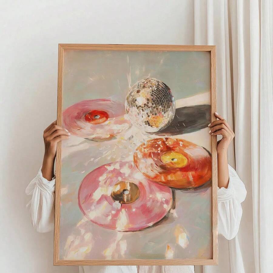 Portrait painting of pink and orange donuts with a mirrored disco ball held by a person