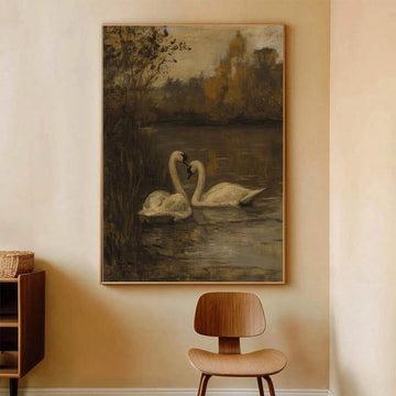 Framed white swan couple canvas poster above a rustic wood cabinet
