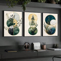 Botanical geometric abstract triptych canvas set displayed above a dark home-office desk