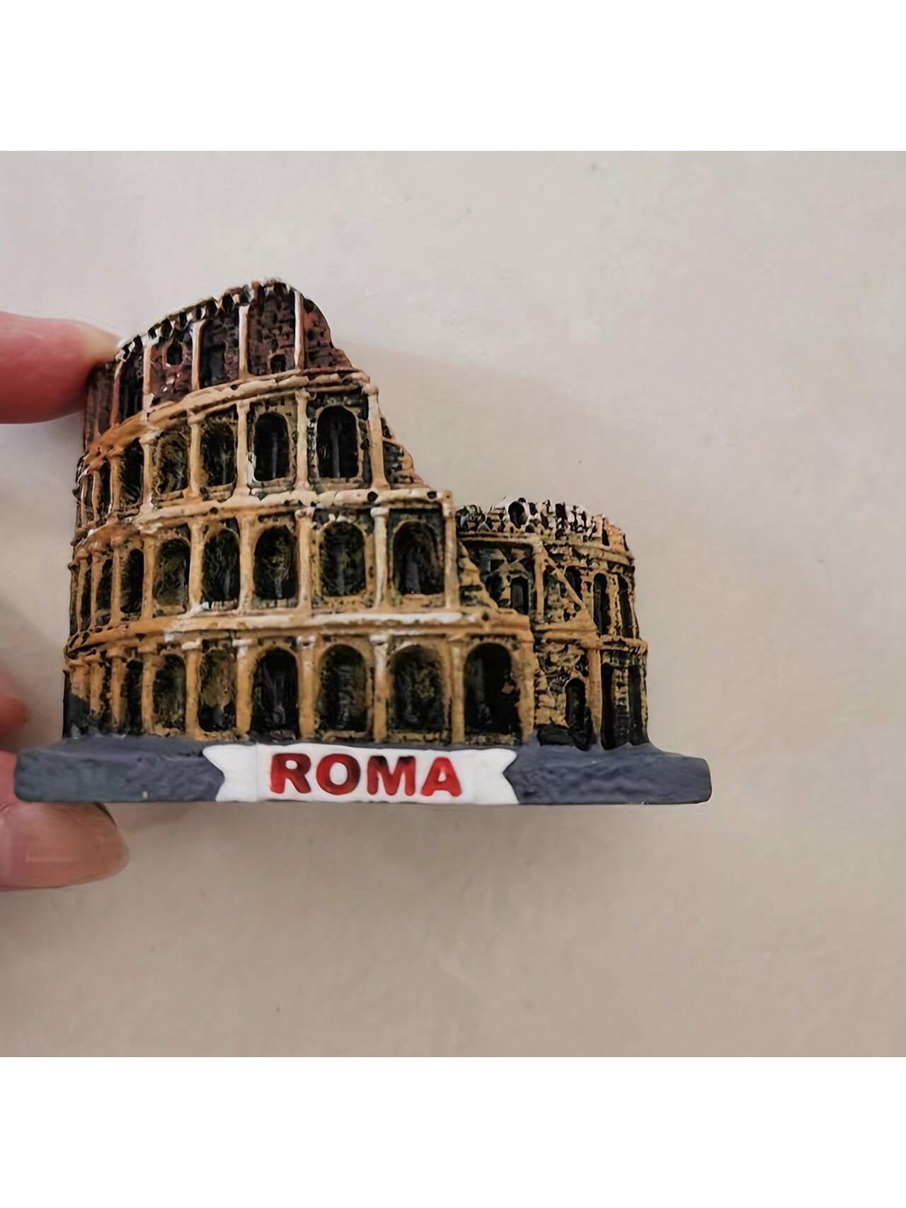 Experience the grandeur and history of the ancient Rome Colosseum with our unique fridge magnet. Perfect for travelers and history enthusiasts, this souvenir is also a stylish addition to any home decor. Own a piece of history and bring the beauty of the Colosseum into your home.