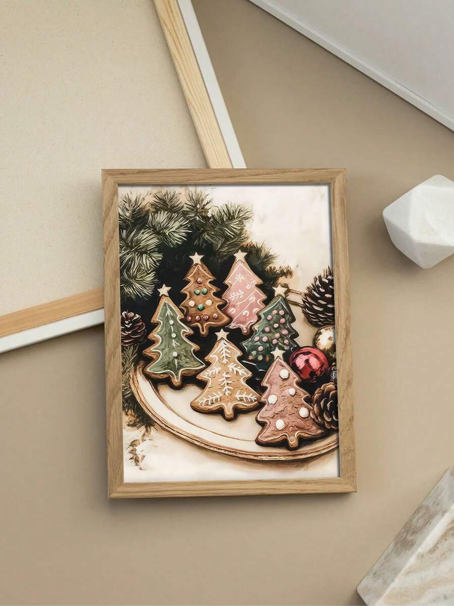 Framed holiday poster of decorated gingerbread tree cookies with evergreen branches and pinecones