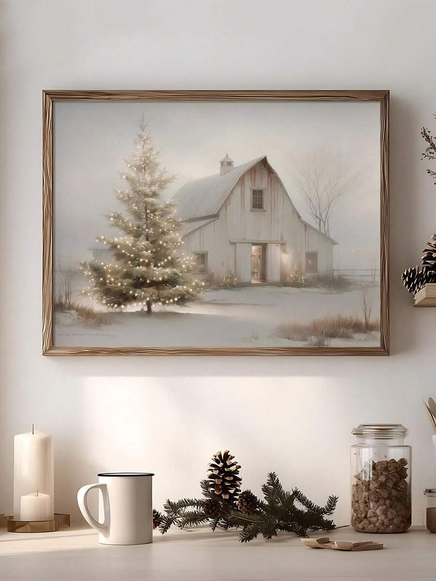 Framed snowy Christmas barn canvas poster displayed above a console with candles and pinecones