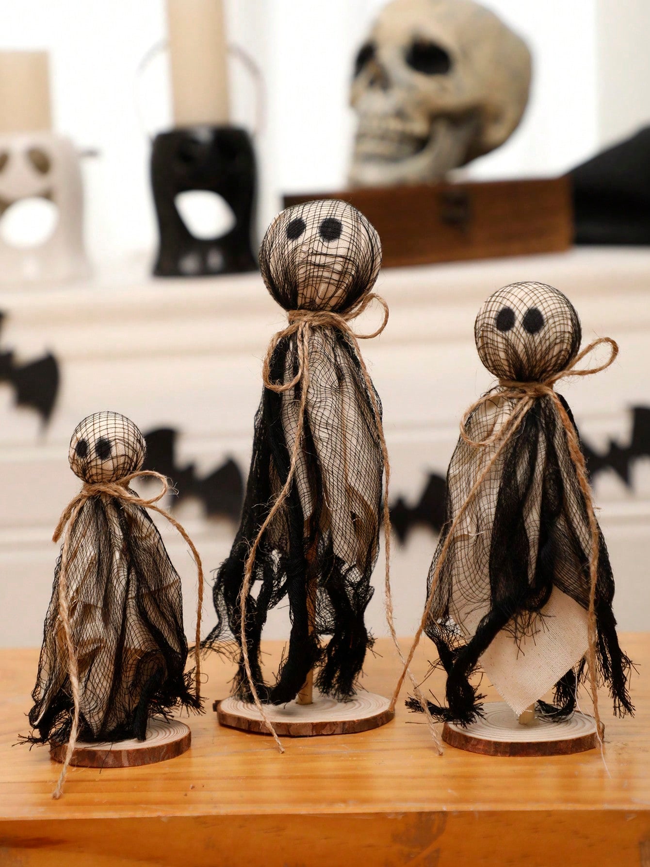 These Rustic Standing Halloween Ghost Figurines are perfect for adding spooky charm to your haunted house decor. Made from high-quality materials, these ghost figurines stand on their own and are a great addition to any tabletop or shelf. Their rustic design adds a charming touch to your Halloween decorations.