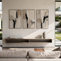 Neutral abstract triptych with black brush strokes and taupe layers