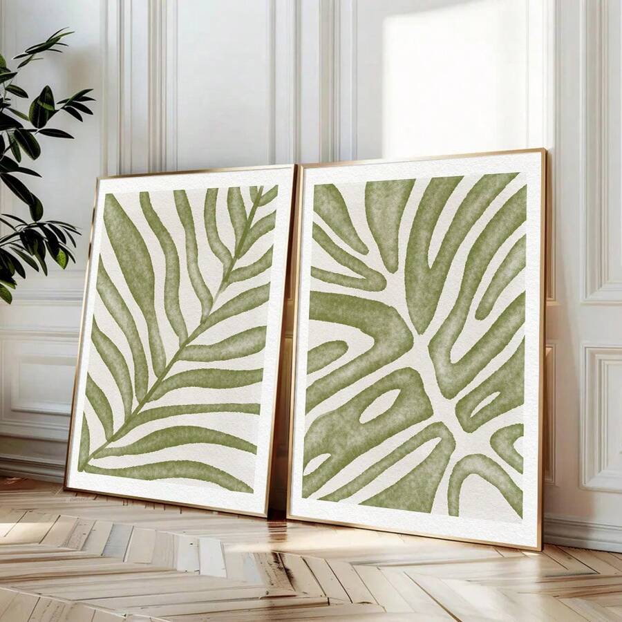 Transform your walls with this elegant set of 2 boho botanical prints featuring minimalist green leaf designs. Perfect for creating a serene, nature-inspired atmosphere in any room—from your living room and bedroom to your home office or kitchen.