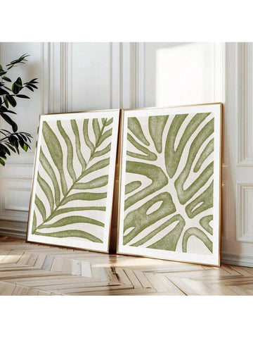 This curated set of two unframed botanical prints features minimalist green leaf designs that embody contemporary boho aesthetics. The refined botanical imagery offers sophisticated wall décor that enhances modern interiors with subtle natural elements. Each canvas print maintains artistic integrity while providing versatile styling options across various rooms, creating a cohesive yet understated visual statement that elevates your space with professional design sensibility.