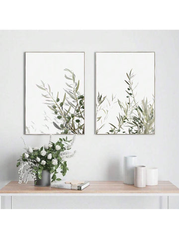 Transform your space with this set of 2 unframed olive branch wall art posters. These sophisticated botanical canvas prints feature delicate olive branch imagery that perfectly complements minimalist coastal home décor. The neutral palette and organic design elements create a serene atmosphere while adding refined visual interest to any room. Ideal for creating a cohesive gallery wall or as standalone statement pieces in entryways, living rooms, or bedrooms.
