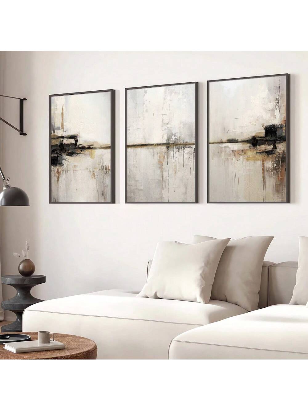Elevate your living space with this set of three black and beige abstract canvas artworks, designed to complement modern Scandinavian interiors. Featuring minimalist forms and neutral tones, these pieces bring a sophisticated balance of contrast and harmony to any room. Crafted for easy installation, they provide a refined visual appeal that enhances the simplicity and elegance of contemporary décor.