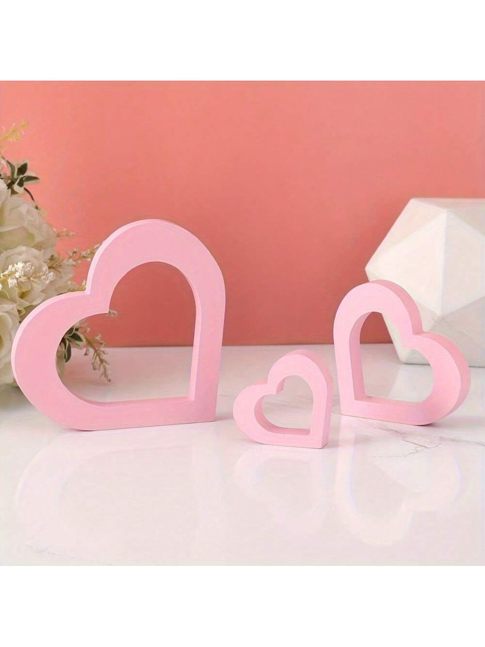 These three wooden heart decorations are perfect for adding a romantic touch to your home decor or for creating heartwarming DIY gifts. Made specifically for Valentine's Day, these decorations are a charming addition to any space. Show your love and creativity with this set of three wooden hearts.