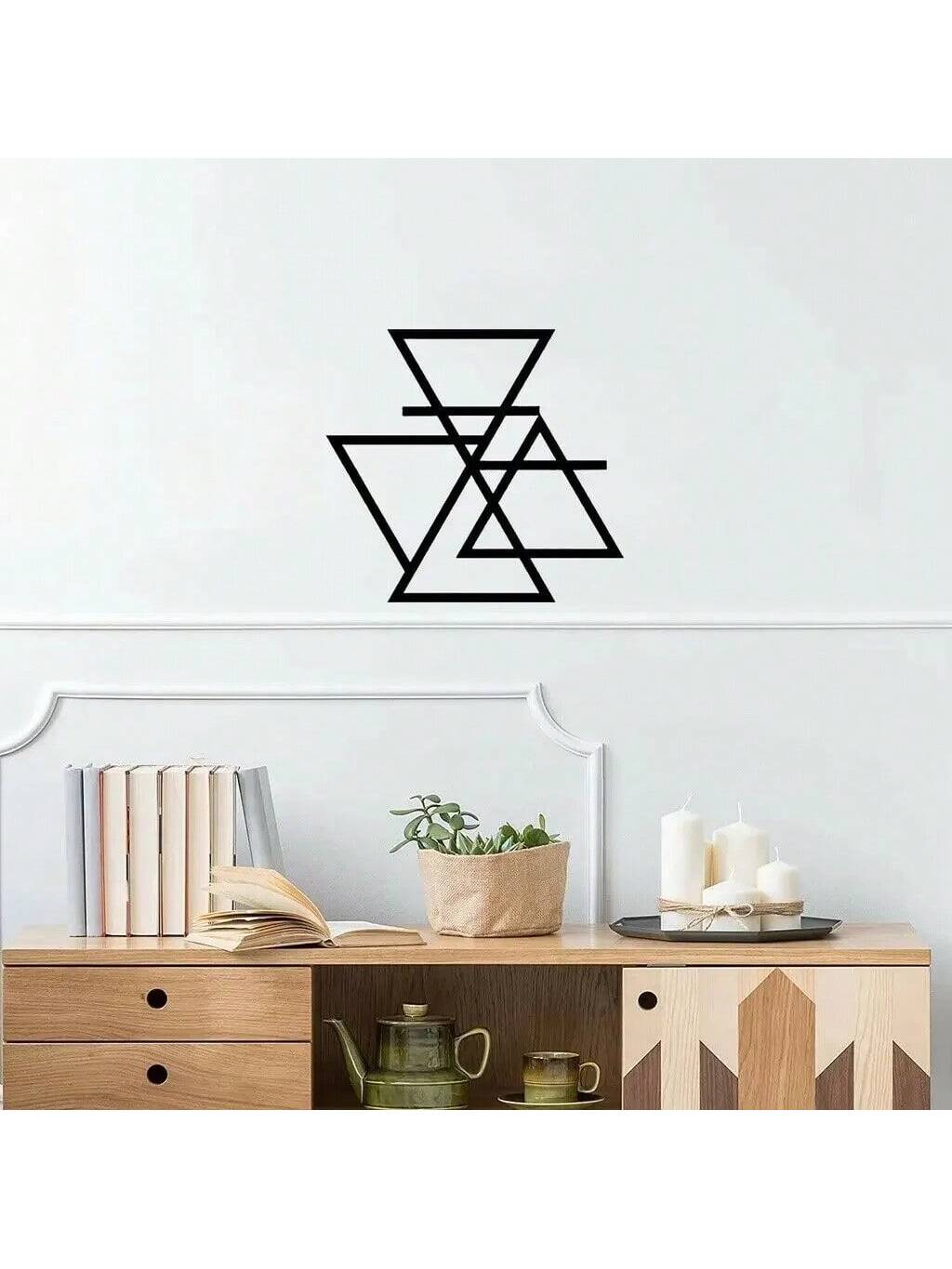 Elevate your living spaces with our Sleek Black Geometric Metal Wall Art. Featuring a modern splicing design, this decorative piece adds a touch of sophistication to any room. Made with high-quality metal, it's durable and long-lasting. Transform your space into a contemporary oasis with this sleek and stylish wall art.