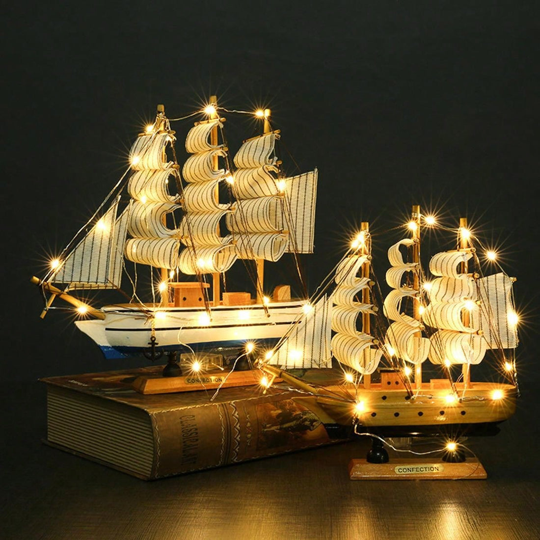 Add a touch of elegance to your home or office with our Smooth Sailing LED Sailboat Decoration. Crafted with a realistic wooden design, it will bring a calming nautical vibe to any space. The LED lights add a warm and welcoming glow, making it the perfect decor piece for relaxation.