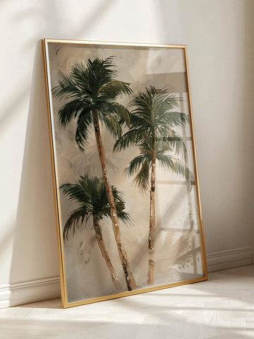 Large framed palm tree wall art leaning on sunlit floor with gold frame