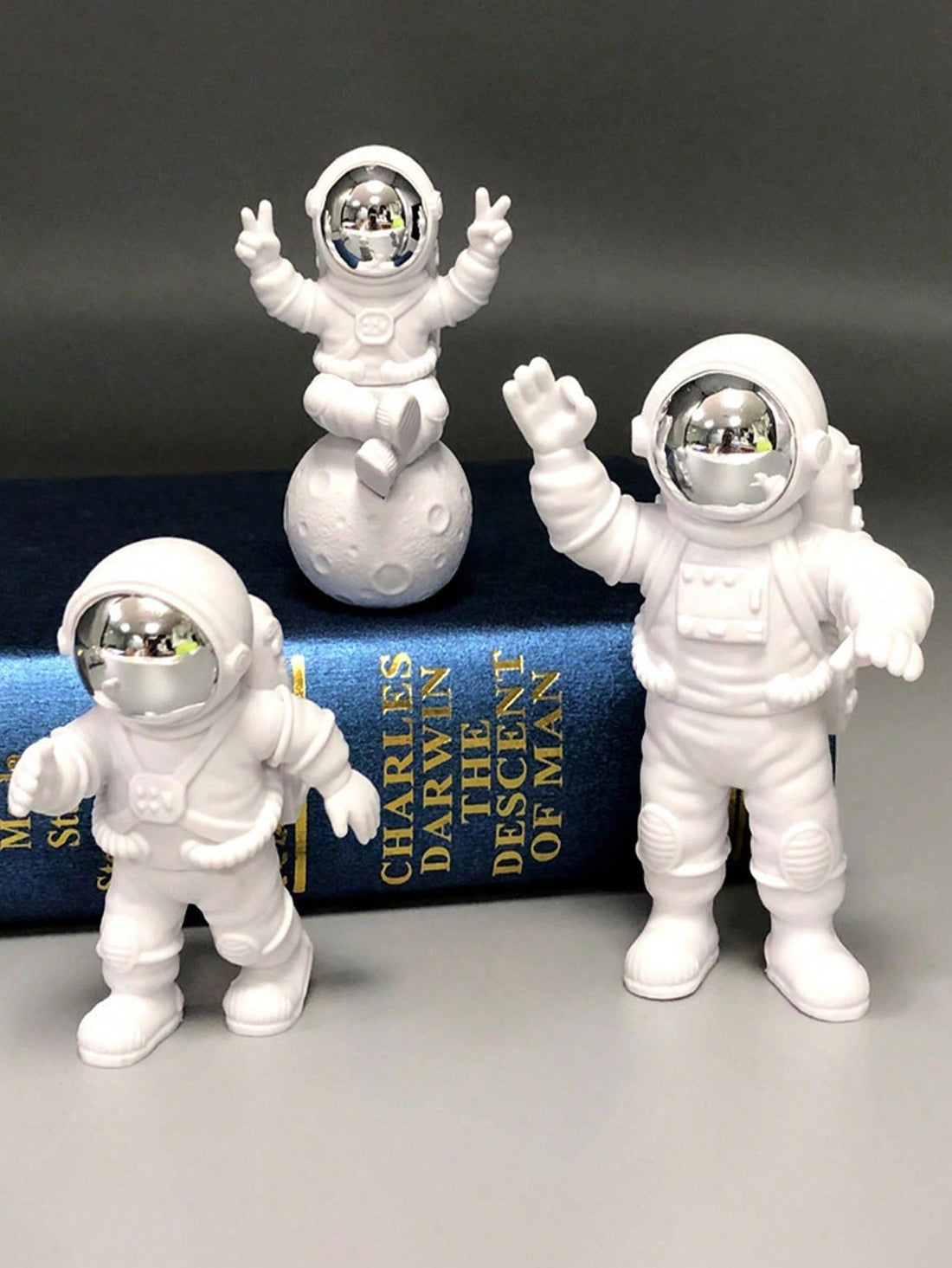 Become an expert in space exploration with our Space Explorer Trio! This set includes astronaut-shaped decor pieces for your home and garden. Made with durable material and precise details, these pieces are perfect for adding a touch of scientific sophistication to any space.