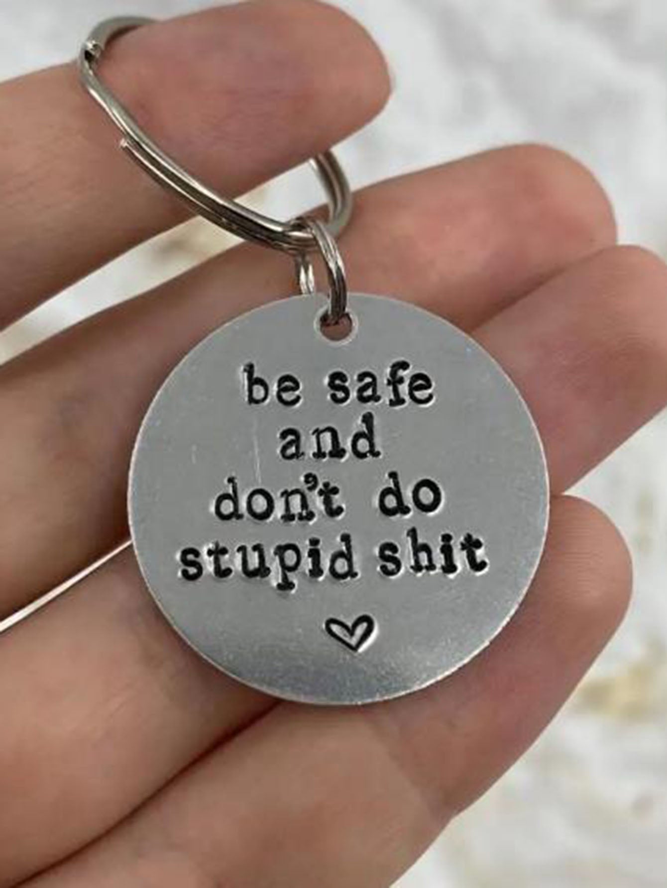 Stay street smart with our 'Don't Do Stupid' keychain! A playful reminder for your everyday adventures, this keychain is a must-have for any adventure seeker. Made with quality materials, it's a durable and practical addition to your daily carry. Stay safe and have fun with Street Smart.