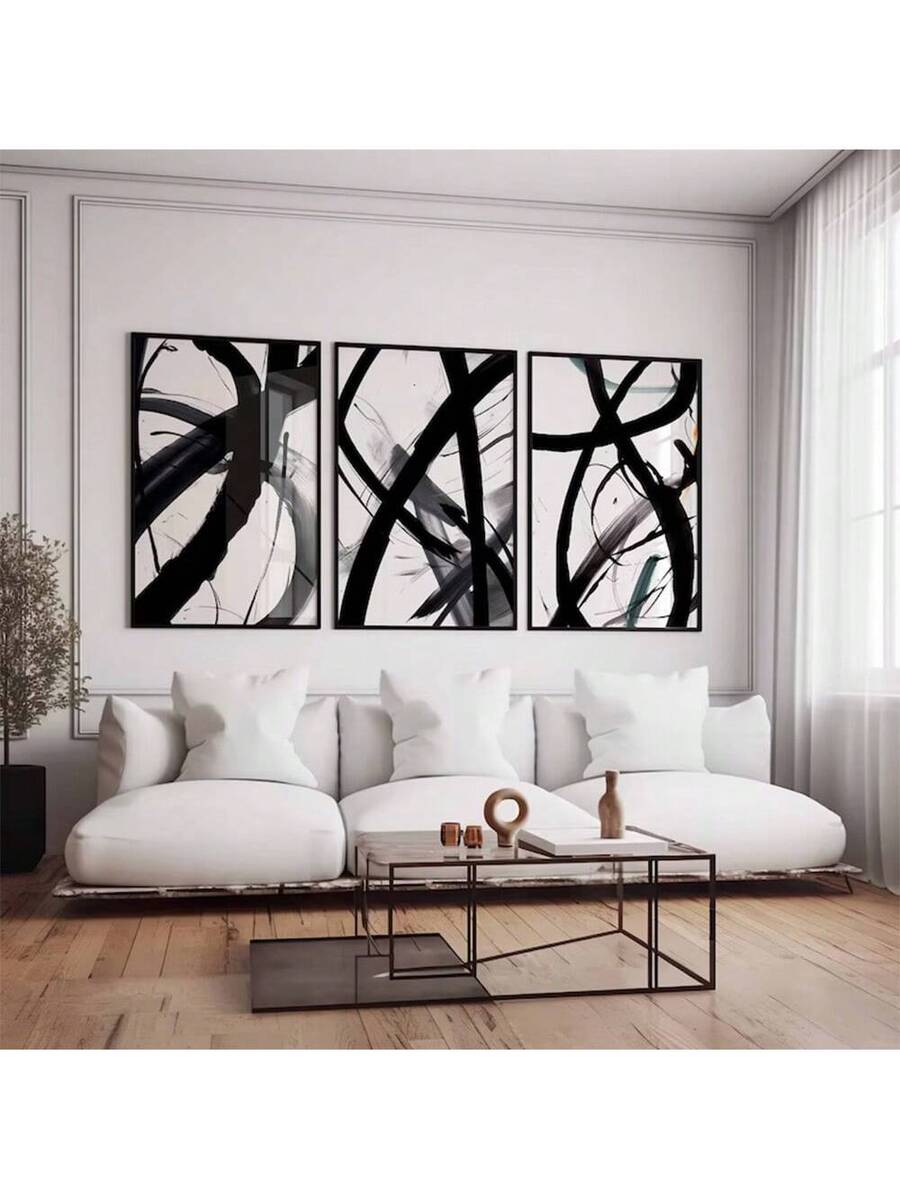 Transform your space with this striking 3-piece black and white abstract wall art collection. Featuring modern graphic designs printed on high-quality non-woven fabric, these versatile prints work beautifully in dining rooms, home offices, or any contemporary setting. The waterproof material ensures durability and easy maintenance, while the minimalist aesthetic complements any décor style. Available in both framed and unframed options to suit your preference. Create an instant focal point that adds sophist