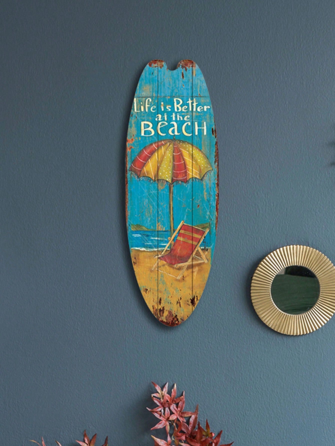 Add a retro touch to your beach-themed room with Surf's Up: Vintage Ocean Board Wall Decor. Hang this unique piece to bring a summer beach vibe to your space. Made with high-quality materials, this wall decor is sure to make a statement in any room.