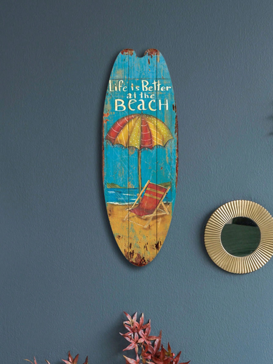 Add a retro touch to your beach-themed room with Surf's Up: Vintage Ocean Board Wall Decor. Hang this unique piece to bring a summer beach vibe to your space. Made with high-quality materials, this wall decor is sure to make a statement in any room.
