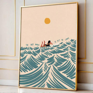 Gold-framed surfing girl ocean wave canvas poster against a paneled wall
