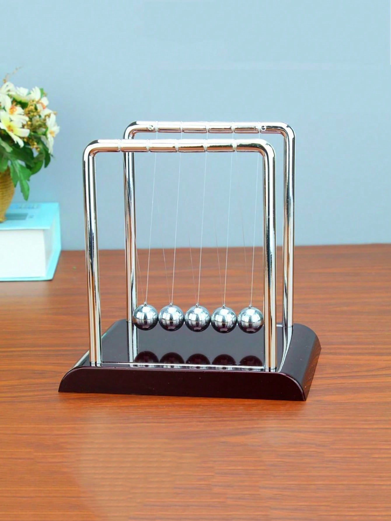 Enhance your workspace with Swinging Mix Chaos, a unique and creative desk decoration that also serves as a stress reducer. Made to boost productivity and reduce tension, this product is perfect for any office or home office setup. Embrace a more productive and relaxed work environment with Swinging Mix Chaos.