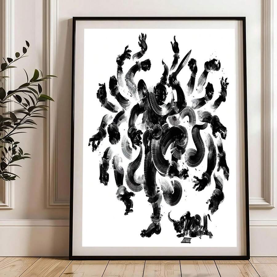 Large black framed Buddhist deity ink poster leaning on wood floor near plant