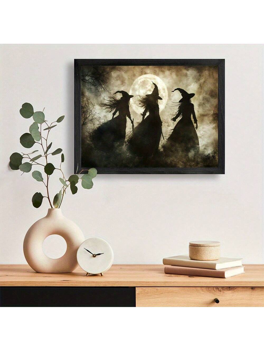 Capture the eerie charm of Halloween with this Three Witches Full Moon poster. Featuring a retro aesthetic on high-quality canvas, it adds a sophisticated, vintage touch to any home or office space. Perfect for seasonal decor or year-round ambiance, this artwork blends classic witchcraft imagery with timeless design, enhancing your environment with subtle mystique and style.