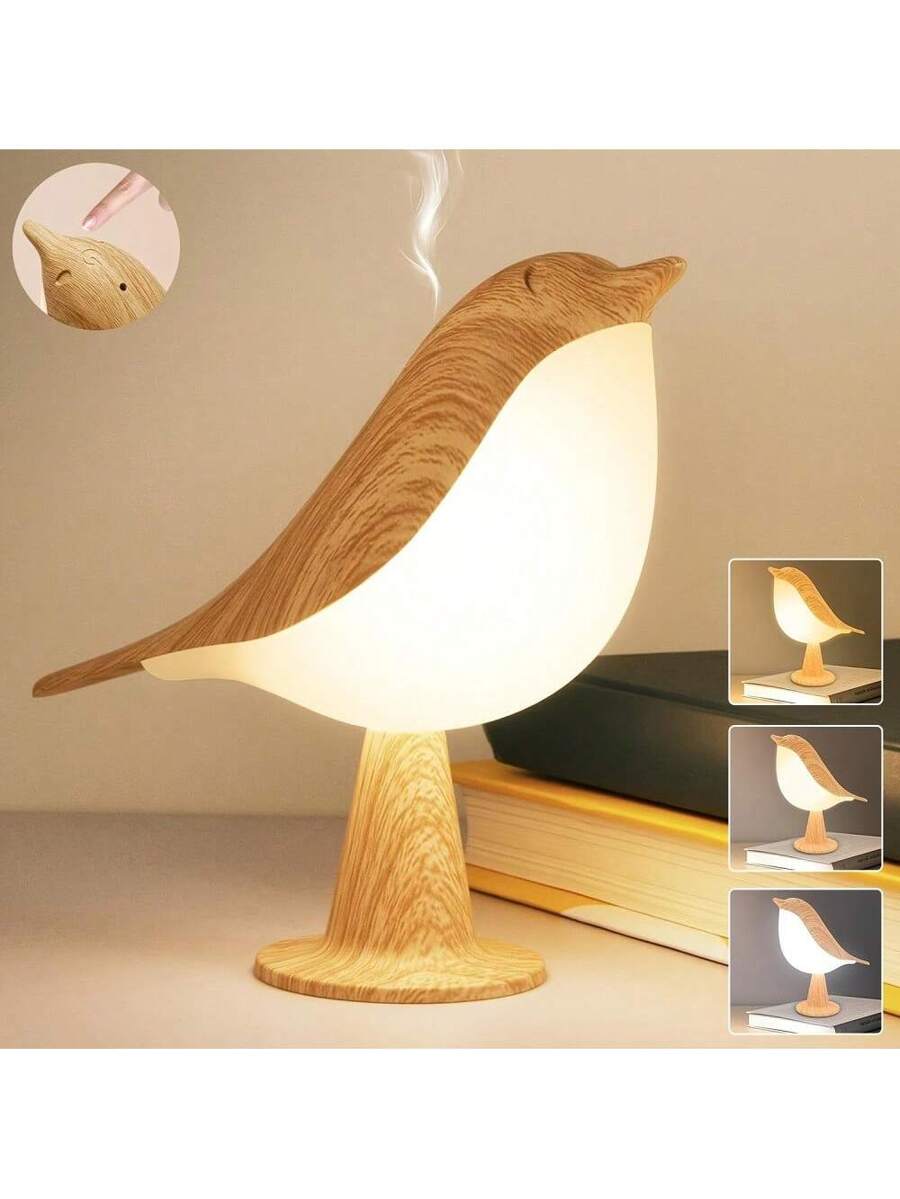 Bird shaped night light on books with glowing white diffuser and wood grain shell.