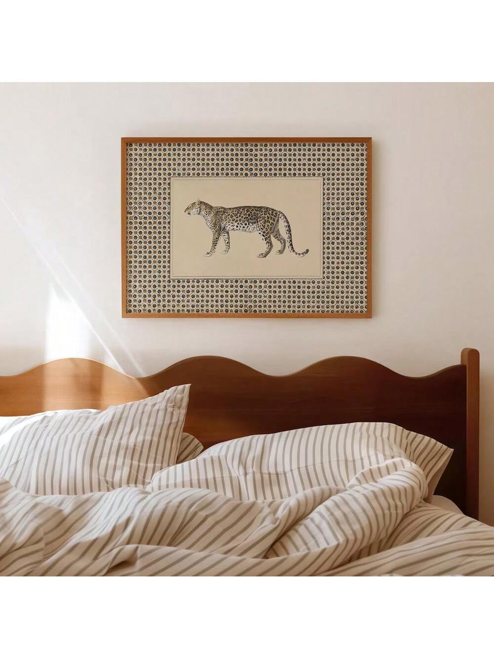 Elevate your space with this unframed vintage leopard wall art canvas print, blending minimalist design with boho retro charm. Perfect for living rooms, bedrooms, or dorms, it adds a sophisticated yet relaxed vibe. The detailed leopard illustration brings a touch of wild elegance, making it a versatile piece that complements various decor styles. Its unframed format allows for flexible display options, letting you customize your interior with ease and expert flair.