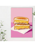 Bring playful charm to your space with this vibrant grilled cheese sandwich art print. Featuring bold, modern maximalist design with geometric and graphic elements, this framed canvas piece combines contemporary style with whimsical appeal. Perfect for kitchens, living rooms, bedrooms, and home offices, it adds personality and warmth to any décor.