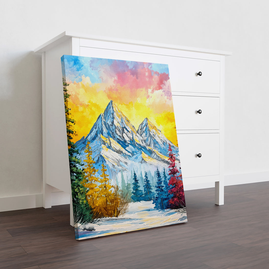 Elevate your interior with this striking impasto mountain landscape canvas print, where bold brushwork and dynamic color create visual depth and movement. The composition captures a dramatic sunset over snow-capped peaks, rendered in vibrant hues that command attention without overwhelming your space. 