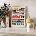 Framed multicolor hip hop lyric canvas styled on a kitchen counter