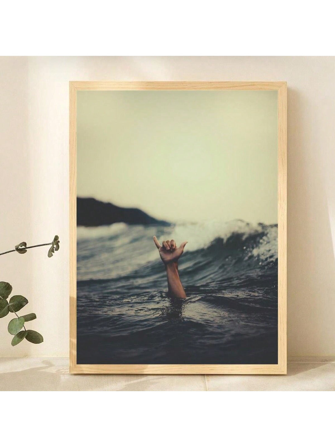 Transform any space with our vibrant Surfer's Hand Gesture Canvas Art Print! This inspirational ocean wave decor will add a touch of energy and motivation to your home or office. Made with high-quality materials, this print captures the dynamic spirit of surfing while showcasing the beauty of the ocean. Elevate your space with this stunning art piece.