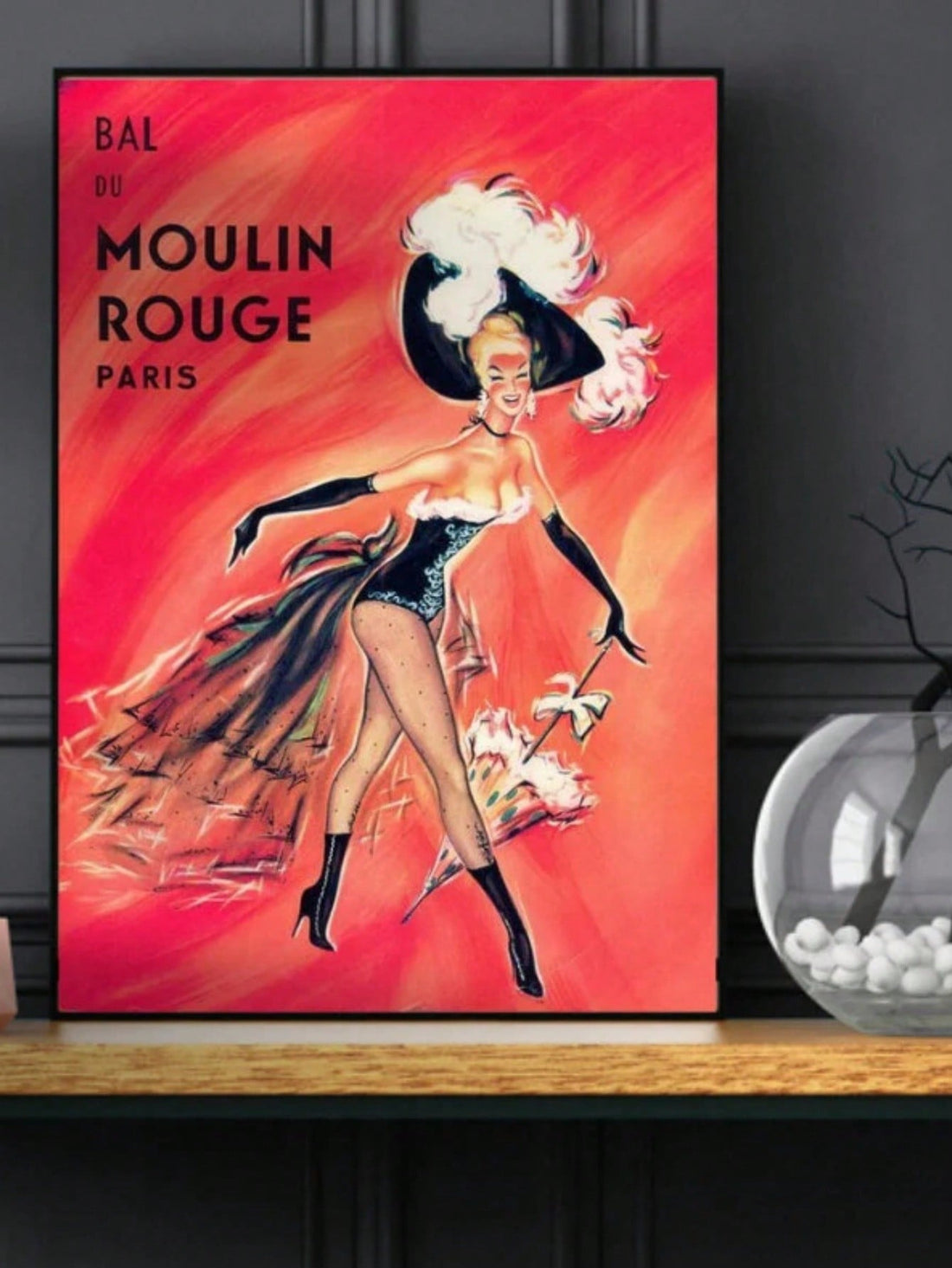 Capture the elegance of the 1920s with this Vintage Moulin Rouge Art Deco print. Featuring iconic design elements from the Art Deco era, this unframed piece serves as a striking wall décor that enhances any living space with historical charm. Ideal for collectors and lovers of vintage style, it also makes a unique and thoughtful gift. Perfect for creating a timeless ambiance in your home or office.