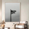 Monochrome American flag waving on a tall pole wall art