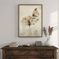 Butterfly botanical print with pale butterfly on white wildflower stem in neutral beige tones