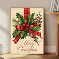 Vintage Christmas holly poster displayed unframed on a wood floor