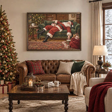 Framed sleeping Santa canvas above a leather sofa in a cozy Christmas living room